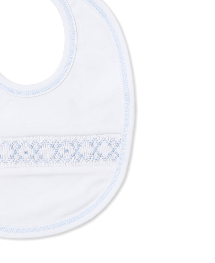 White with Light Blue Hand Smocked Bib